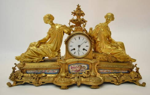 Miroy Freres Ormolu Clock w/ Porcelain Mounts: Movement Marked Etablissement De Paris Miroy Freres 1851. A French Mid 19th century ormolu and porcelain mounted mantel clock. Porcelain dial marked "Milroy Freres Brevetes" and "Paris". Case surmount