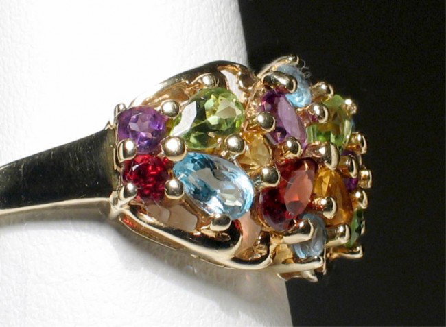 10K Ladies Fashion or Dinner Ring: 3.2g, size 7, 14 brilliant stones (garnett, spinel, citrine, amethyst.
