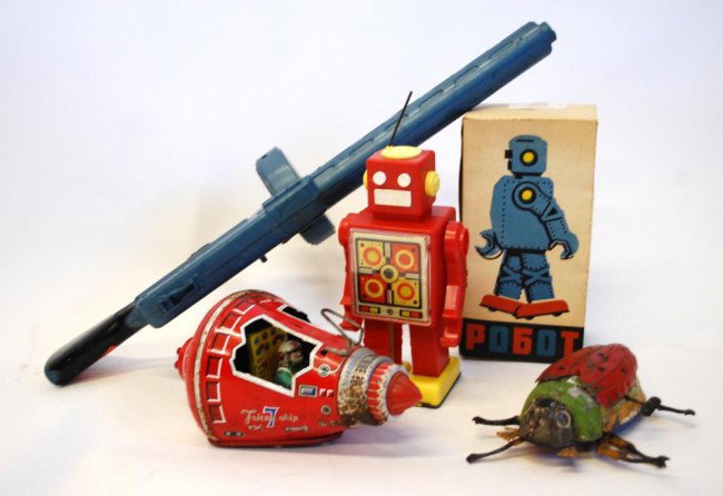 Antique Toys, Friendship 7 SpacePod, Russian Robot: Wind Up Ladybug Tin Litho, Marx Lunar Tommy Gun. Ladybug and space shuttle have condition issues.