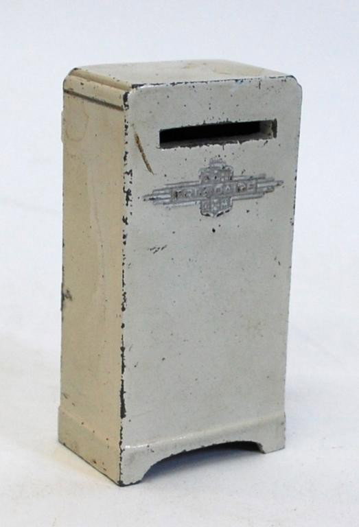 National Products Corp. Frigidaire Bank: White Metal. Small indentation on right side, minor paint loss. 4" tall.