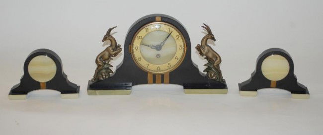 Art Deco Garniture Set-Marble and Onyx: with two brass leaping gazelle, probably french circa 1930.