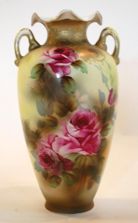 Nippon Vase-Royal Nishiki: Ruffle Rim, Hand Painted Roses, and applied gilt decoration. Trademarked Royal Nippon. Gold Moriage Lining & Beading on Front of Neck. 12.5" tall.