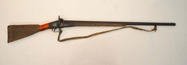 19th c. Percussion Gun: Approximately 10 gauge percussion shotgun. Lock marked "Improved Tower Gun" also with a Crown over "1874" mark. Barrel marked with what appear to be two crossed sword cartouches, the number "10" , and