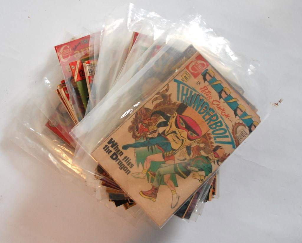 52 1960's Comic Books : Includes Tales to Astonish, Tales of Suspense, Tales of the Unexpected, The Rawhide Kid, Billy the Kid, Cheyenne Kid, Texas Rangers, Two Gun Kid, Ringo Kid, Kid Colt Outlaw, Charlton Army, Enemy Ace, 