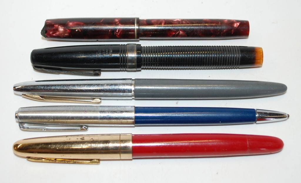 5 Waterman Pens, 4 Fountain Pens and one: Ink Pen. Some condition issues.