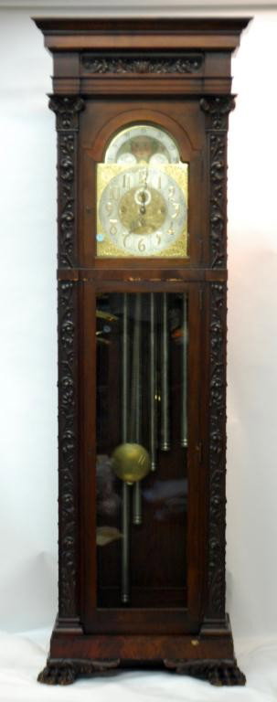 19th Century Elliot London Tall Case Clock: Large 19th Century Elliot London Tall Case Clock. Flat-topped molded Bonnet with central hand carved acanthus leaves over a stippled ground above a hand-painted moon phase dial depicting two moons, a 