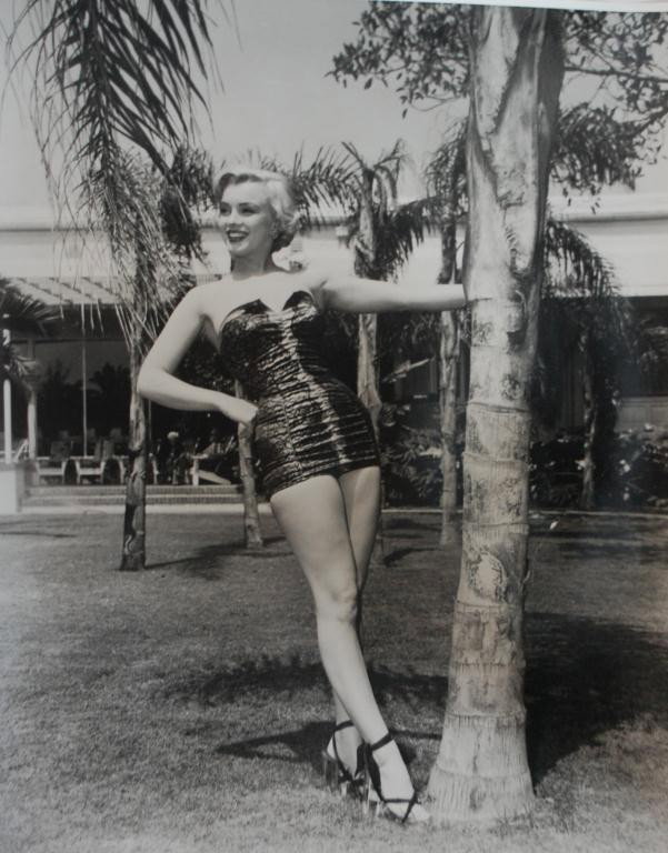 Marilyn Monroe Silver Gelatin Photograph 16" x 20": Original publicity Photograph of a young Marilyn Monroe in heels and a swimsuit. Rare image printed from negative owned by a NC Collector. The negatives were purchased at various national auction hous