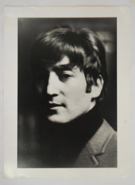 Hatami Signed Photograph of Beatle John Lennon: signed by Hatami and labeled Photographed in Liverpool 1962, 1995 printing of the photo. 11" x 14"