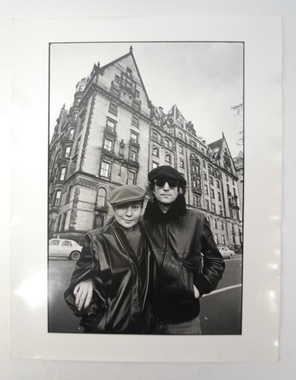 John Lennon & Yoko Ono Photo by Tannenbaum: in front of The Dakota in Manhattan, the building where John was assasinated. Photo taken by John Lennon and Yoko Ono's personal photographer, Allan Tannenbaum. Signed verso by him, with copyright dat