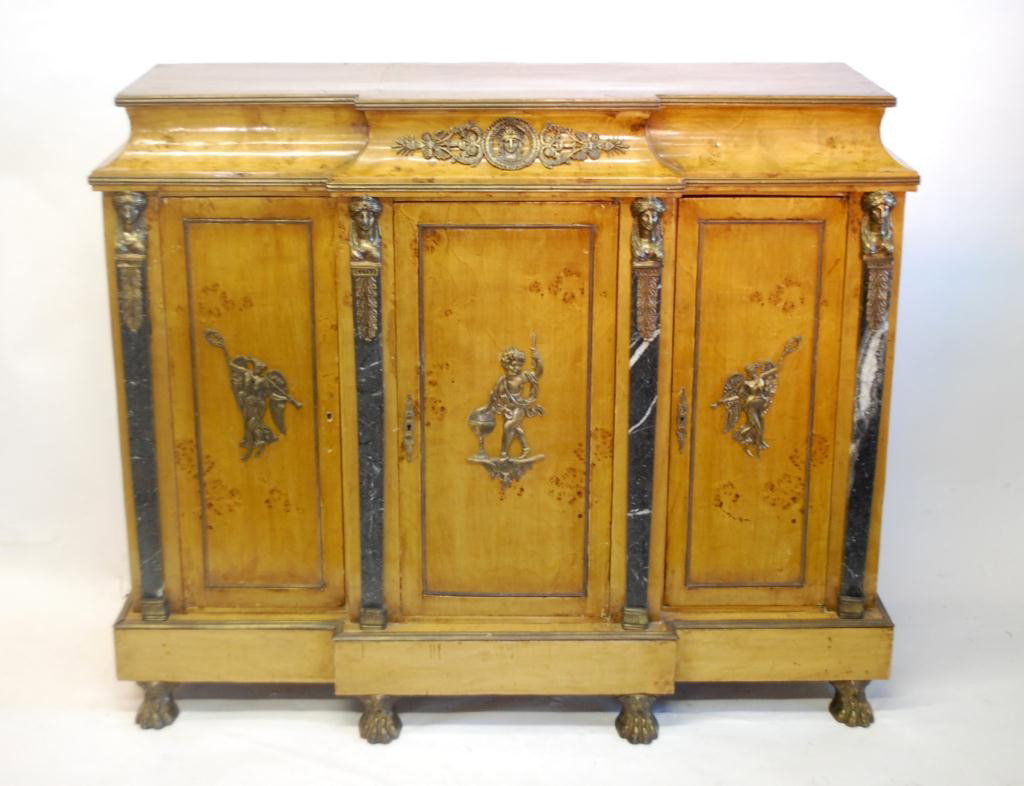 Ornate Birdseye Maple Sideboard -Ormolu Mountings: and applied Marble. Brass figural mountings and brass string inlay, brass lions paw feet.