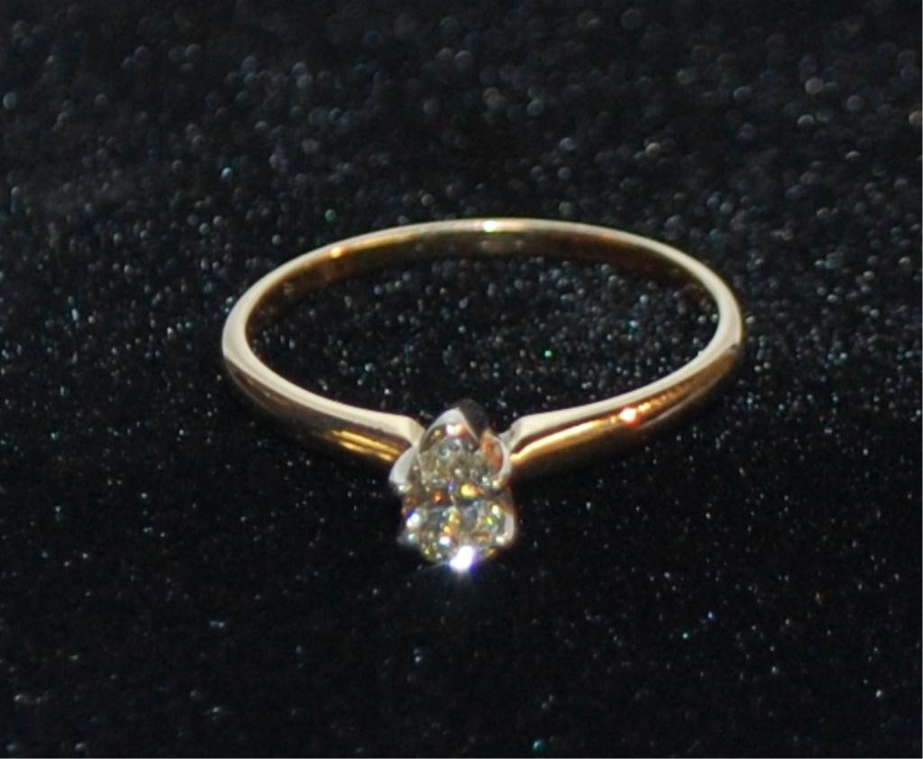 Pear Shaped Diamond Solitaire Ring set in 14K Gol: approximately .48 carat diamond, total weight over 3 grams, size 10