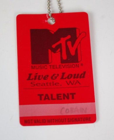 Kurt Cobain's MTV Talent Pass 1993: Red Plastic MTV Badge from the Live and Loud Concert in Seattle, Washington December 1993. Top of badge with large MTV logo printed above the title "Live & Loud".."Seattle, WA". Bottom of badge reads