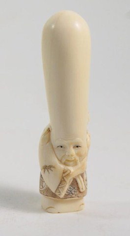 Ivory Signed Netsuke Wisdom God: Man with tall head, holding a turtle by the tail. 3" tall, in carved box. Provenance: Owned by, and consigned by the Grandson of, Thomas H. Keating General Motors VP of all car divisions and GM board 