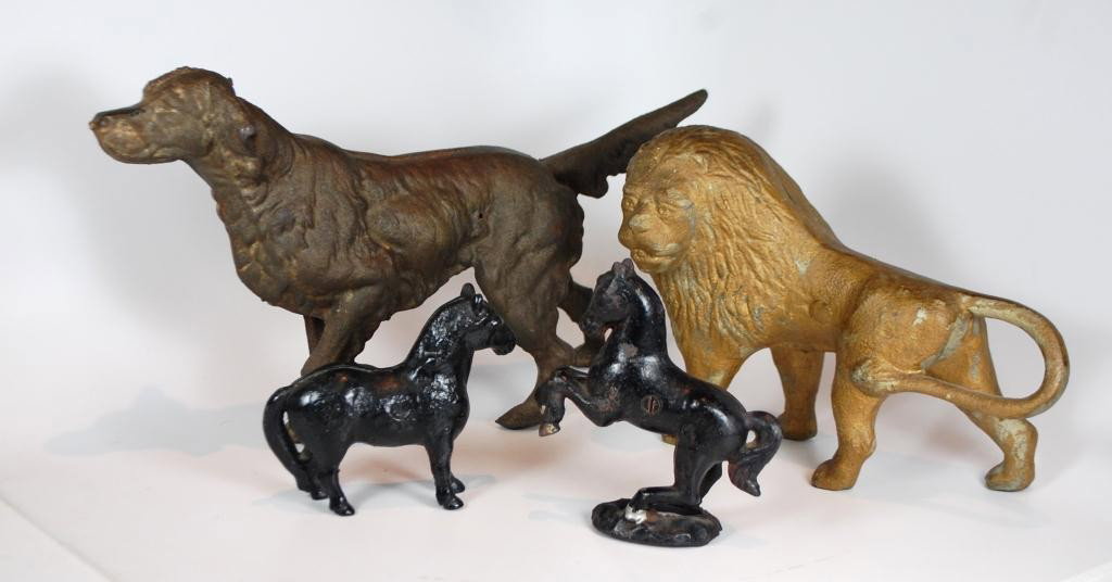 Cast Iron Doorstops & Banks: Arcade Mfg. Cast Horses, Gold Painted Lion with flailing tail, and pointer dog, possibly Hubley