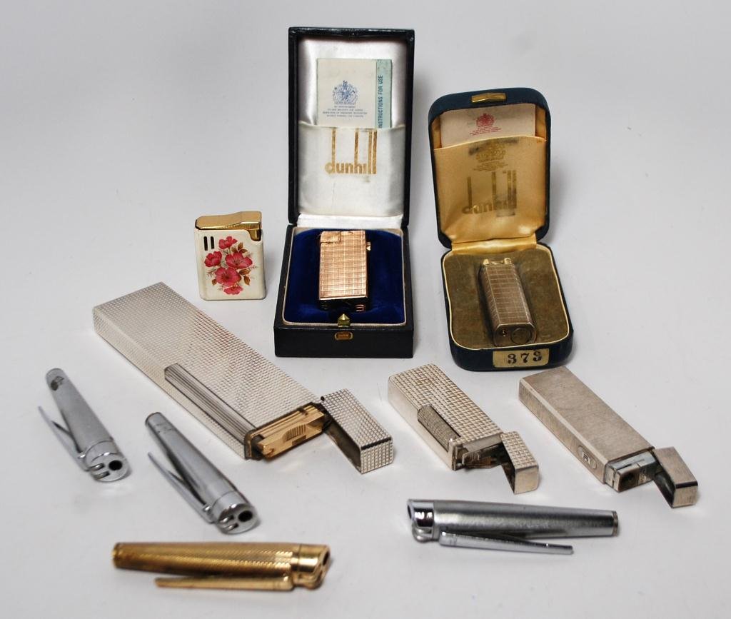 Group Mid Century Lighters Sterling Dunhill Dupon: ST. Dupont Diamond Head Table Lighter in Silver Plat Finish, Consul W Germany Diamond 925 Sterling Lighter, Dunhill Paris Gold Colored lighter in original box with instructions, Dunhill Paris Silver C