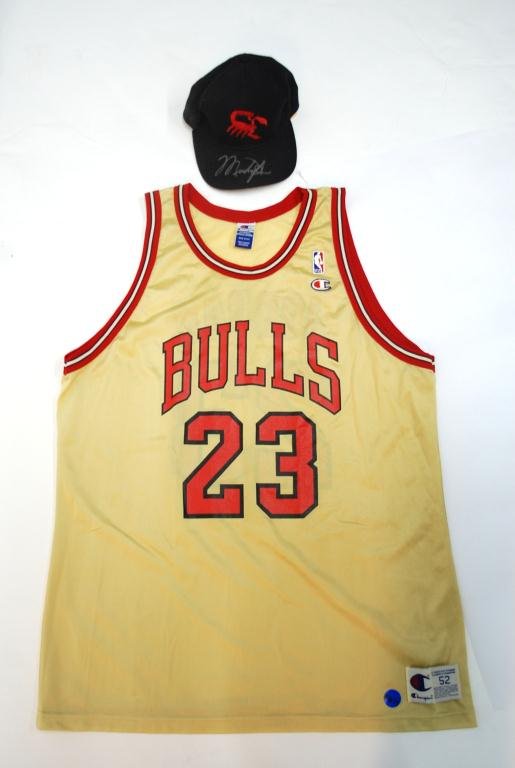 Michael Jordan Signed Jersey & Minor League Hat: Signed Bulls Jersey & Signed Scottsdale Scorpions baseball hat. Not from a smoke free home.