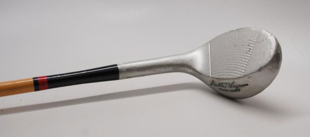 Walter Hagen "Sandy Andy" Sand Wedge: Early Steel sheeth staft marked "True Temper". Circular face scoring.