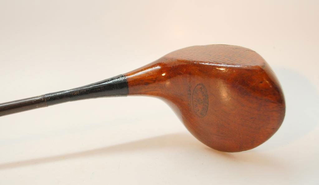MacGregor Driver: Marked "MacGregor Dayton, Ohio". Full Brass sole plate. Cross Hatch Line Scoring on Face. Early steel sheath shaft stamped "True Temper Patd. Shaft".