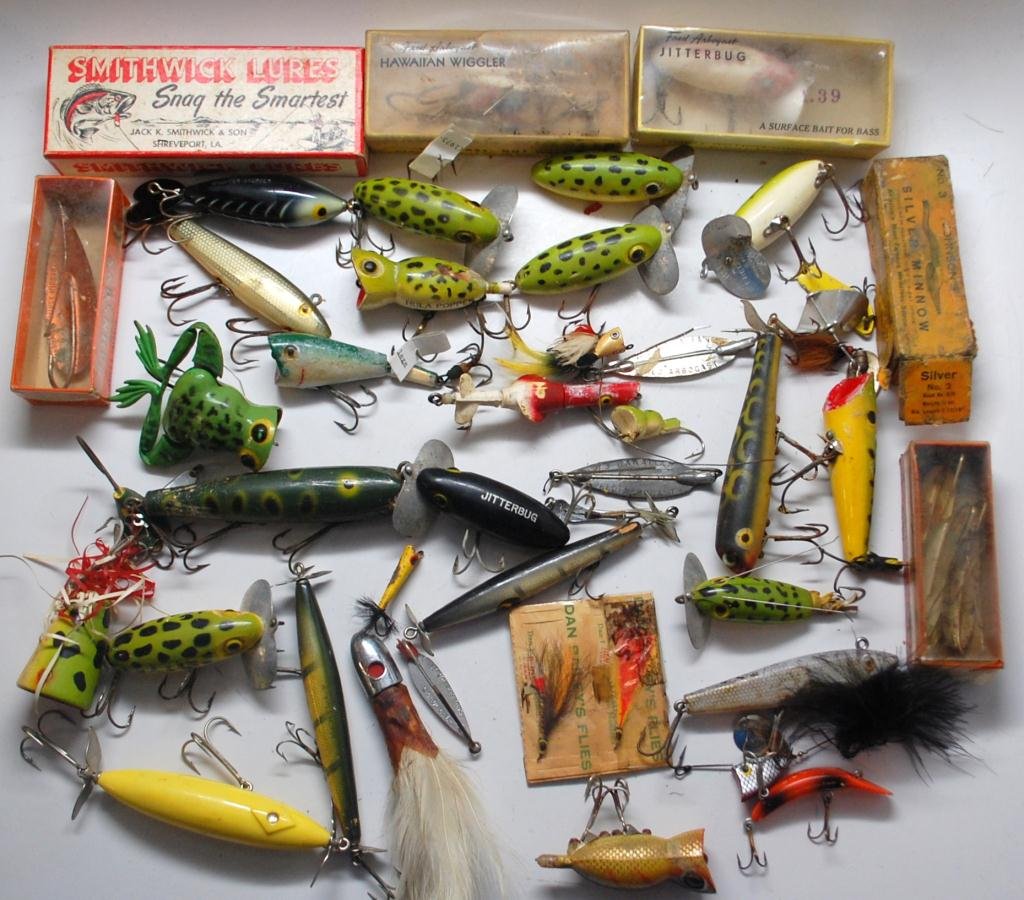 Large Group Vintage Fishing Lures: Numerous Vintage Fred Arbogast Lures including Jitterbug in Box, Hawaiin Wigglers in Box, Johnson Lures including two Spoons in Box, Silver Minnow in box, Smithwick including Devils Horse in Box, two 