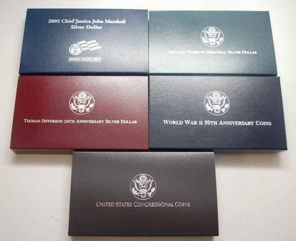 5 Boxed Silver Coin Sets: 2005 Chief Justice Silver Dollar, Vietman Veterans Memorial Silver Dollar, Thomas Jefferson 250th anniversary Silver Dollar, WWII 50th Anniversary 2 Coin Set, and US Congressional 2 Coin Set.