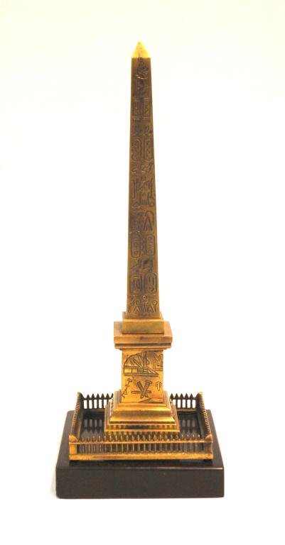 19th C Egyptian Grand Tour Brass Obelisk: Obelisk with Egyptian Hieroglyphics Square Marble plinth with brass gallery fence, probably French. 10.5" tall
