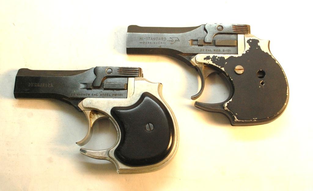 2 Derringer Hi-Standard .22 Guns: Models DM-101 and D-101. Models DM-101 and D-101. One missing grip. Additional Terms and Conditions for SALE OF FIREARMS Buyer’s Premium of 13% with 3% discount for cash or check. 3% Additional prem
