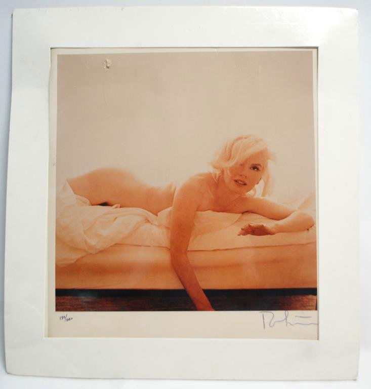Marilyn Monroe Photographed by Bert Stern: "Last Sitting" Hand signed and numbered, damage shown in photo. Tear to upper left. Should be repairable. Within sealed plastic. 20" x 24"