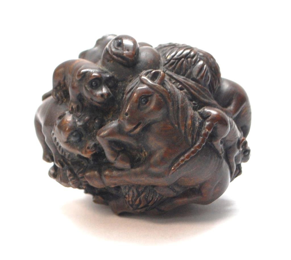 Carved Rosewood Ball Netsuke, Ornate: animals with glass eyes