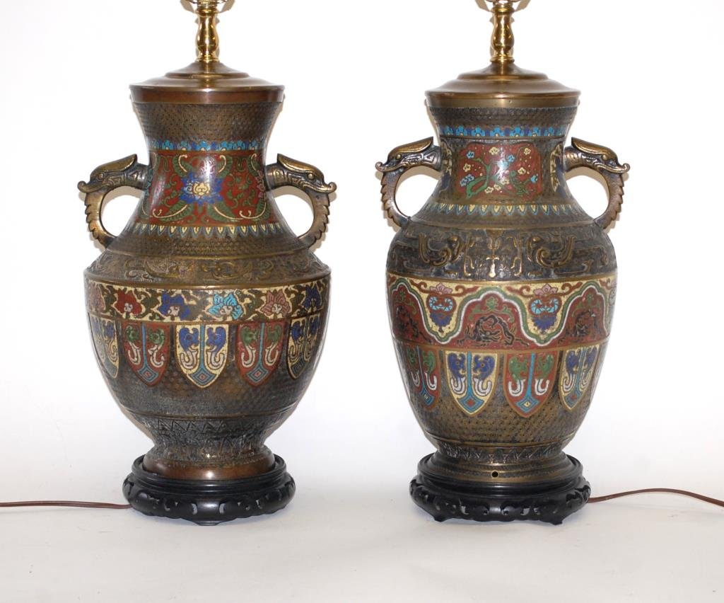 Chinese 19th c. Champleve Lamps: A Pair of baluster form Champleve Vases converted to lamps. With figural dragon handles.34" to top of finial