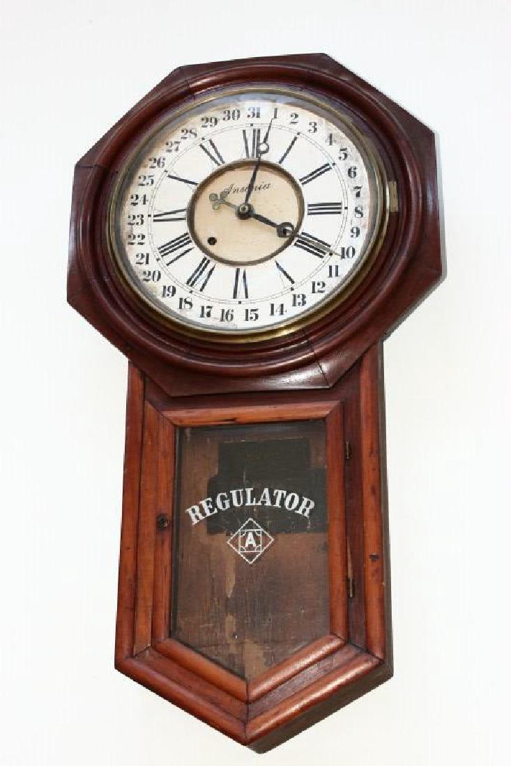 Ansonia Regulator Wall Clock,: with circular dial, set with Roman and Arabic numerals, with glass door, with exposed pendulum, key and pendulum, l 80cm