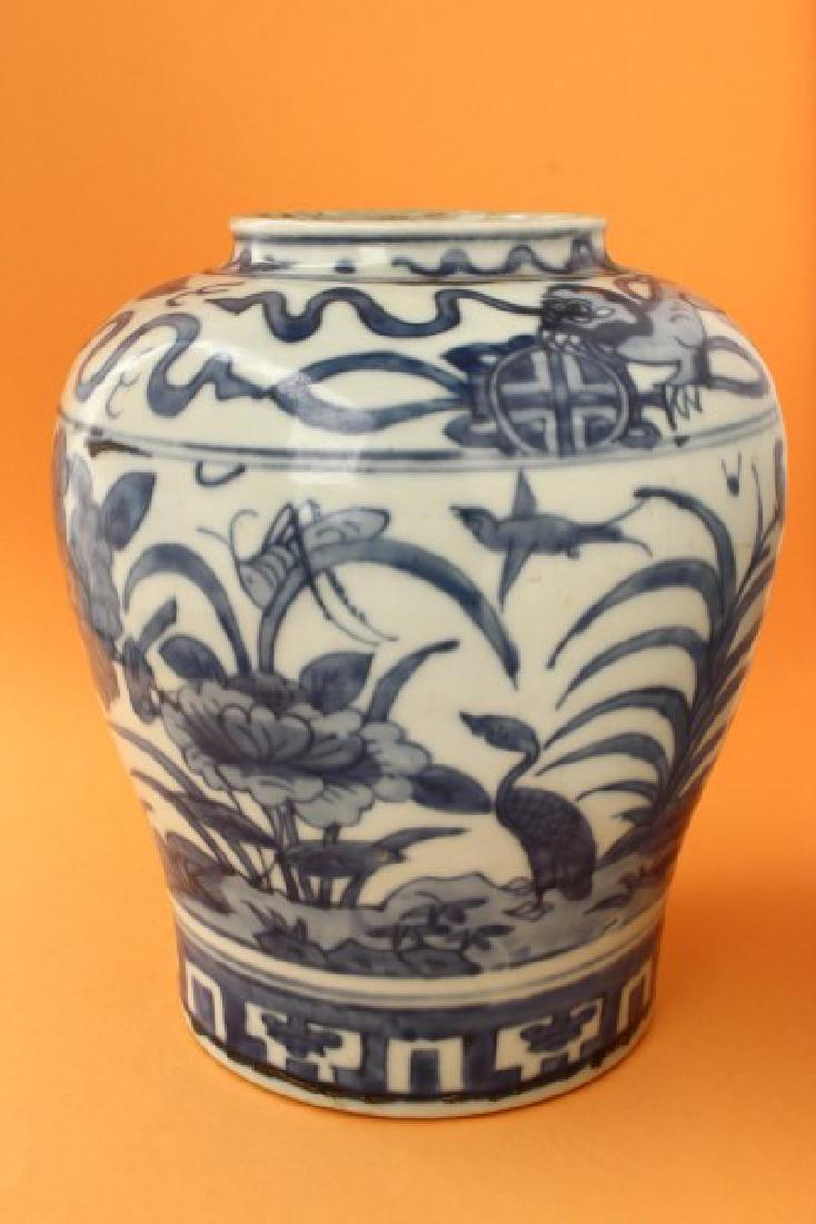 Chinese Ming Dynasty Blue and White Porcelain Jar,: of tapering baluster form, the shoulders decorated with Buddhist lions, above a border of floral, duck and insect motifs, h 22.5cm Provenance: Private Collection Northern NSW