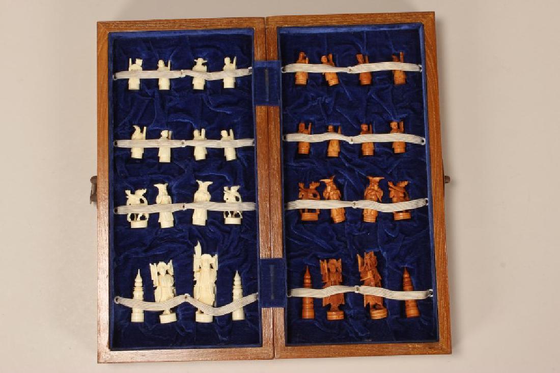 Chinese Carved and Stained Chess Set,: carve din the form of traditional figures, with box