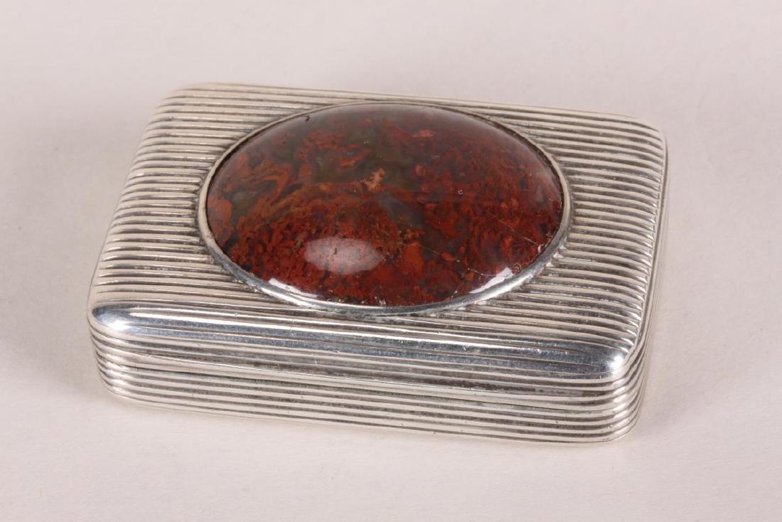 19th Century English Sterling Silver Snuff Box and: Cover, hallmarks rubbed, of rectangular form, set with a agate cabochon, surrounded by reeded body, 5.7cm x 3.8cm
