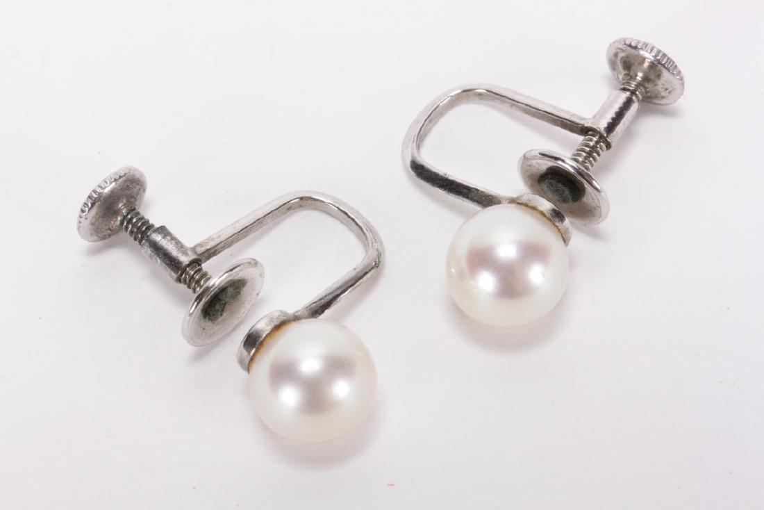 Pair of Mikimoto Earrings,: set with single pearls, boxed