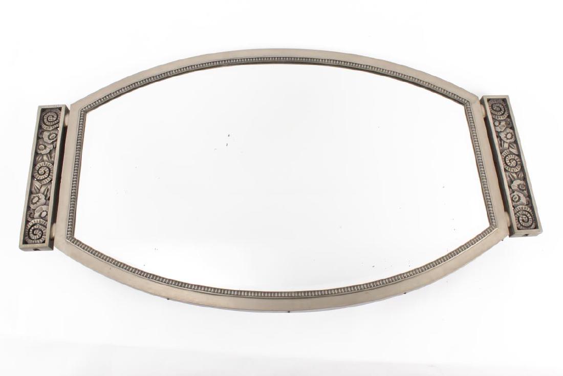 Good Art Deco Wall Mirror by Marcel Bergue,: with bevelled mirror, with roped border, flanked by stylised floral motif, signed Bergue, l 95cm