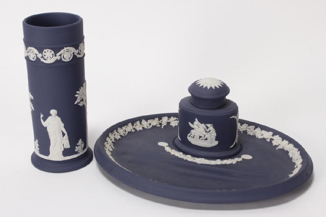 Wedgwood Jasper Ware Desk Set and Spill Vase,: decorated with classical scenes and acanthus motifs, in white on blue, impressed Wedgwood//Made in England, h 17cm