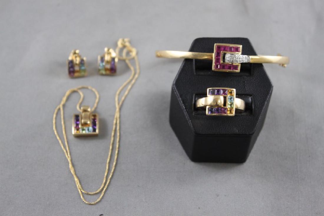 'Guy Laroche' 18ct Gold and Gemstone Suite,: comprising bracelet, ring, earrings, pendant and chain, set with garnets, amethyst, blue topaz, peridot, citrine, rubies and diamonds, total weight 29gm (5)