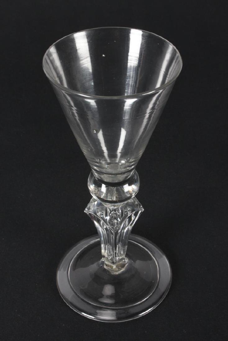 Georgian Silesian Stem Wine Glass, c.1735,: with funnel shaped bowl above knop and Silesian stem on folded foot, h 16cm Provenance: A number of pieces of the collection featured in the 'Circle of Glass Collectors Commemorative Exhibition 1937 -