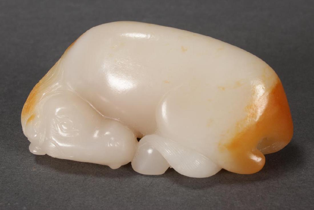 Stunning Chinese Reclining Horse,: beautifully carved, in tones of white with a yellow skin, l 7.5cm