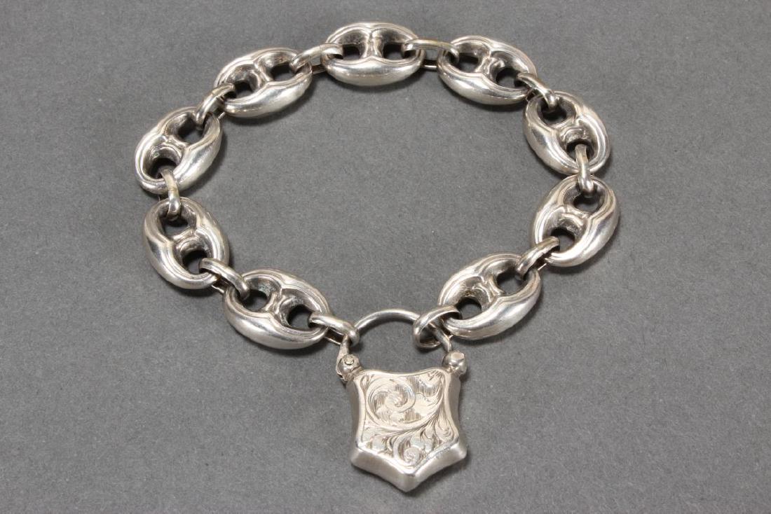 Edwardian Silver Bracelet,: of link form with shield fastener
