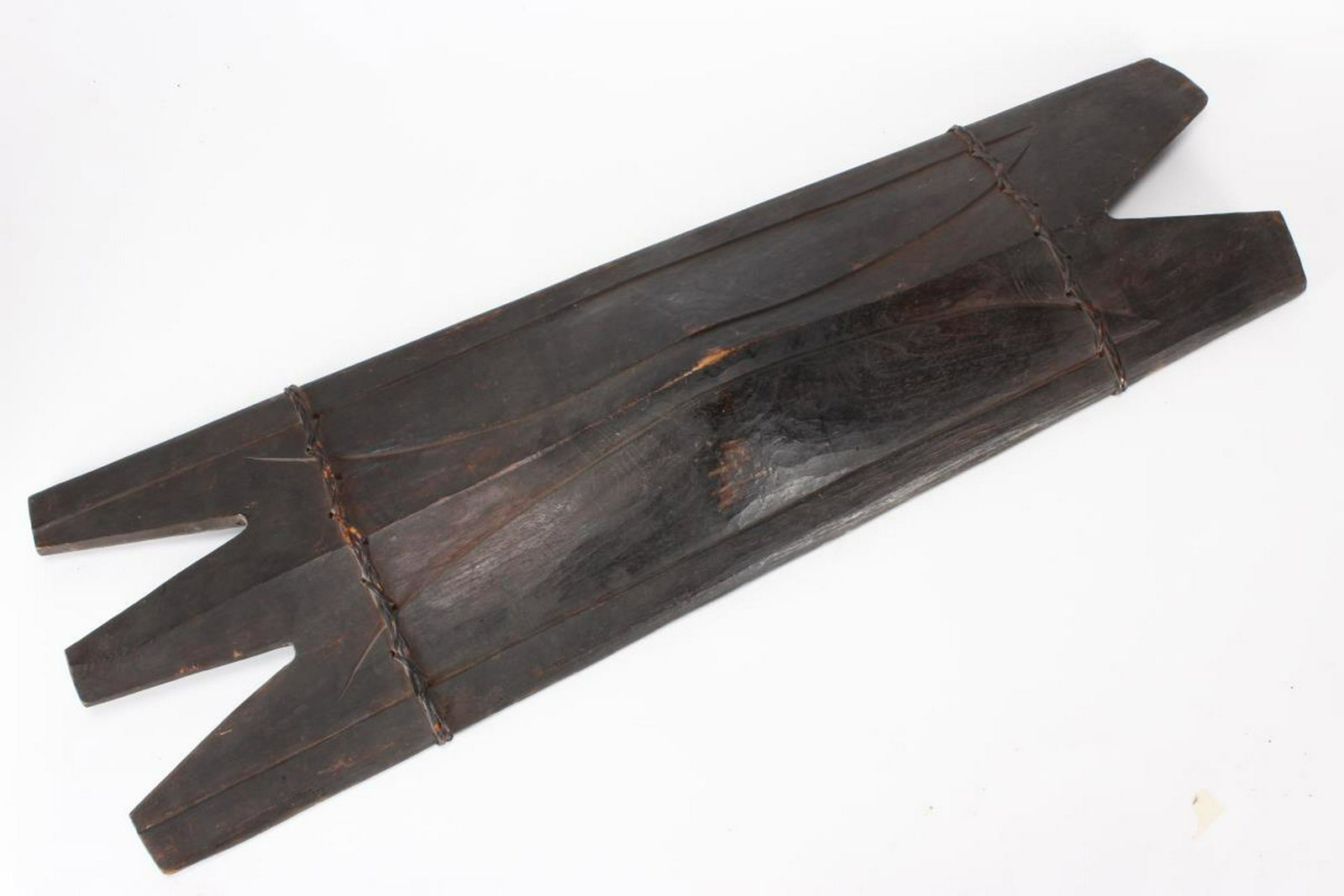 Large Ifugao Bulul Shield,: Philippines, of rectangular form, with crenulated top and base, with curved body and woven natural fibre, h 105cm Provenance : Theodore Bruce Auctions, then Private Collection Sydney,