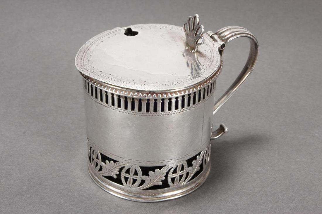 George III Sterling Silver Mustard Pot,: hallmarked, Sheffield, 1788, V.G & H, of cylindrical form, with pierced floral lower border and blue glass liner, h 7cm