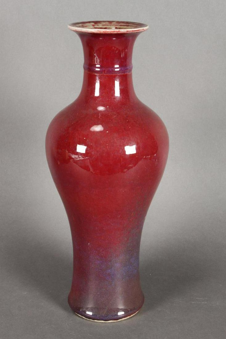Chinese Sang De Boeuf Porcelain Vase,: of baluster form with an elongated body, six character mark to base, h 40cm