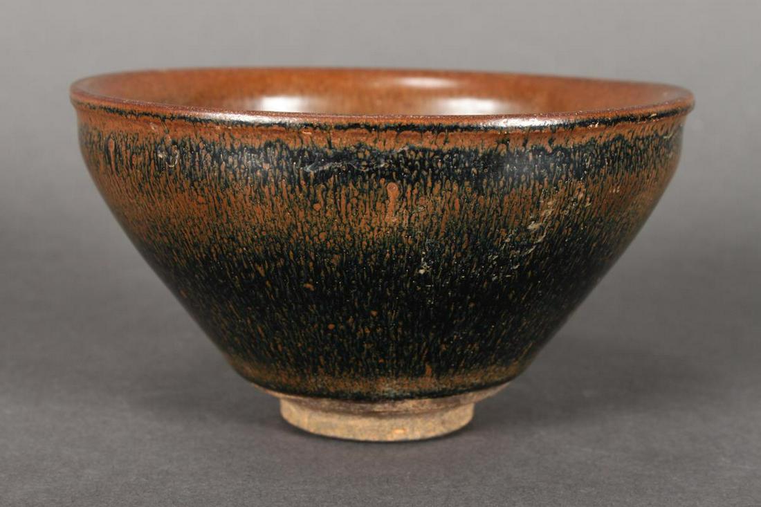 Chinese Fur Glaze Bowl,: thickly potted with sloping sides, in a brown and black striated glaze, on exposed foot rim, d 13cm