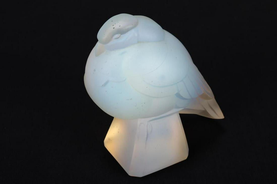 French Sabino Opalescent Glass Dove Car Mascot,: depicted perched with head tucked into chest, on tapering facetted support, signed Sabino, France to base, 9cm x 9cm