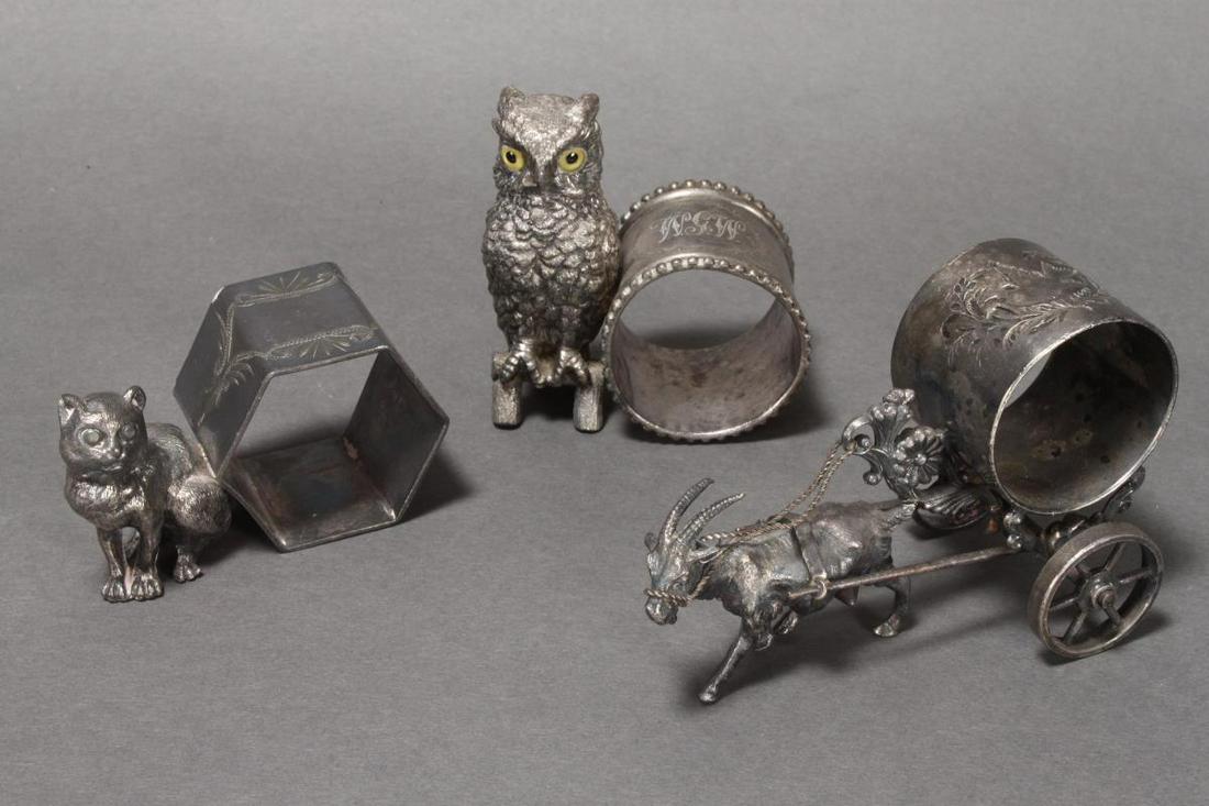 Three Silver Plate Figural Napkin Rings,: including cat, owl and ox with cart, marked Meriden and Knickerbocker (3)