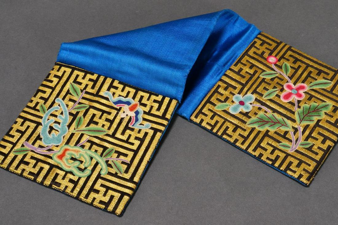 Chinese Late Qing Embroidered Belt Purse,: decorated with couched maze pattern in gold thread, with very fine Peking knot bats, flowers and buddha's hand citron, on a rich blue silk ground, 19cm x 9cm