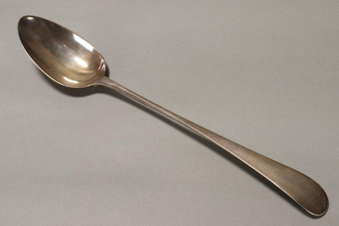 George III Sterling Silver Basting Spoon,: hallmarked, London, 1793, G.G (George Gray), with tapering long handle and oval bowl, total weight 84gm, length 28.5cm