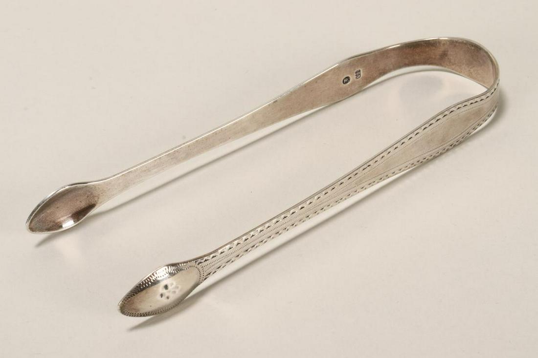 Pair of Georgian Sterling Silver Sugar Tongs,: hallmarked Hester Bateman, with bright cut decoration, total weight 31gm, length 13.5cm