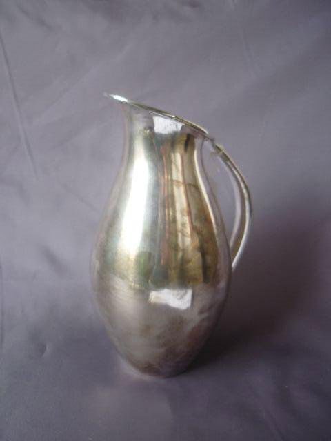 Georg Jensen Sterling Silver Ewer, c.1950: designed by Johan Rohde, of classic slender form, with a loop handle, no: 432, h 23cm
